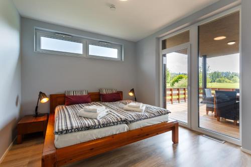 Postel nebo postele na pokoji v ubytování Apartmán na golfu