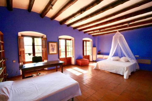 Säng eller sängar i ett rum på Casa rural alquiler íntegro Cal Sisco
