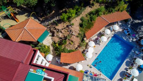 an overhead view of a resort with a swimming pool at Hotel & Spa Tino Sveti Stefan in Ohrid