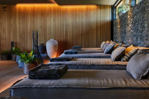 a row of beds lined up in a room at Hotel Gerl in Salzburg