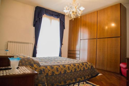 Letto o letti in una camera di B&B Nuovo Paradiso