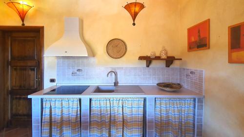 Η κουζίνα ή μικρή κουζίνα στο Welcomely - Casa Ginestra