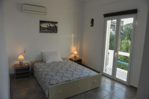 Postel nebo postele na pokoji v ubytování Splendide Apartments