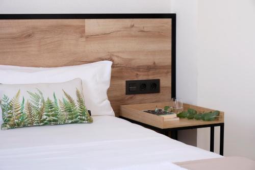 Letto o letti in una camera di Sweet Sevilla Suites