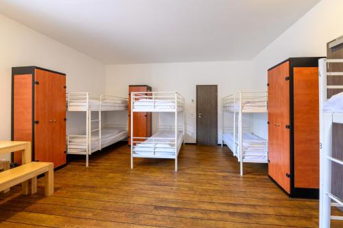 Postel nebo postele na pokoji v ubytování Art Rock Downtown Hotel