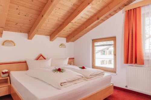 Postel nebo postele na pokoji v ubytování Hotel Albarella