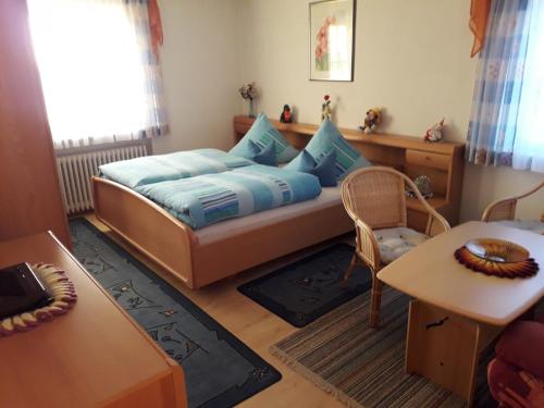 En eller flere senge i et værelse på Ferienwohnung Dreiländereck