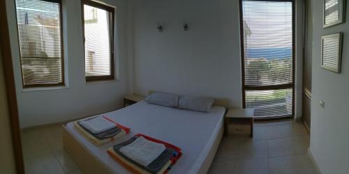 Säng eller sängar i ett rum på Wonderful family villa with sea view