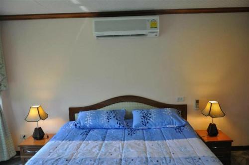 Postel nebo postele na pokoji v ubytování Suksabai Pool Villa