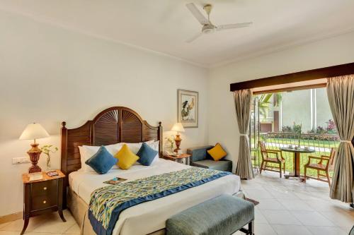 Posteľ alebo postele v izbe v ubytovaní Club Mahindra Acacia Palms