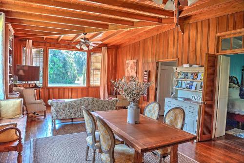 a living room with a wooden table and chairs at Open Gates Bed & Breakfast in Darien