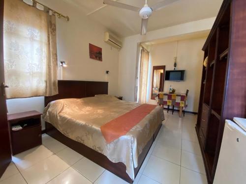 Katil atau katil-katil dalam bilik di Monalysa Holidays