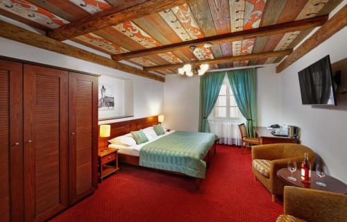 Кровать или кровати в номере Hotel Lippert