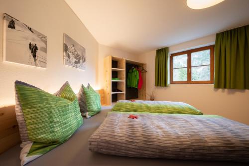 Postel nebo postele na pokoji v ubytování Ferienwohnung Carmen Schuchter