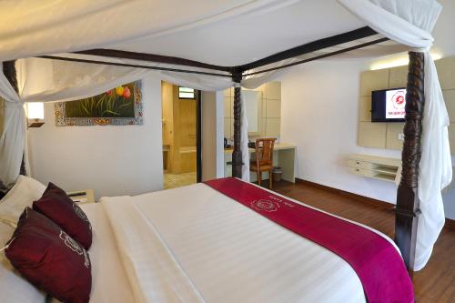 Katil atau katil-katil dalam bilik di Puri Saron Hotel Seminyak