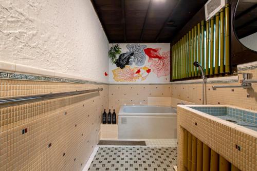 a bathroom with a tub and a sink at Oyado - Vacation STAY 92345 in Nagasaki