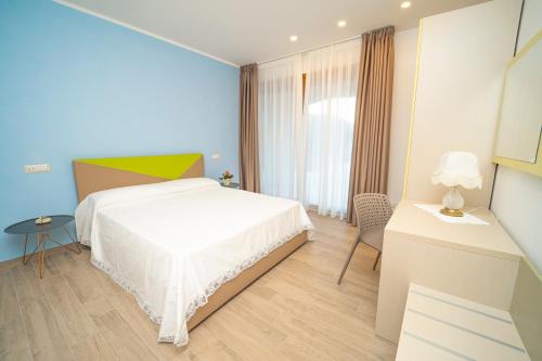 Cama ou camas em um quarto em tra Sole e Limoni Apartments
