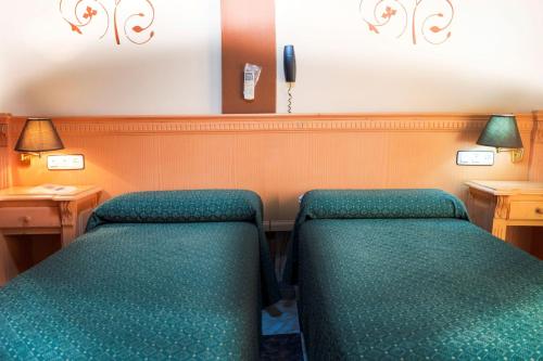 Ένα ή περισσότερα κρεβάτια σε δωμάτιο στο Hotel El Cruce Chauchina