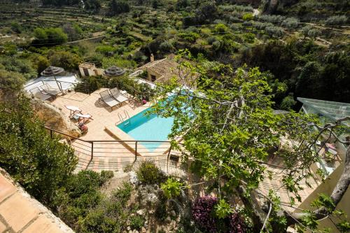 an overhead view of a swimming pool in a villa at Bajo El Cejo in El Berro