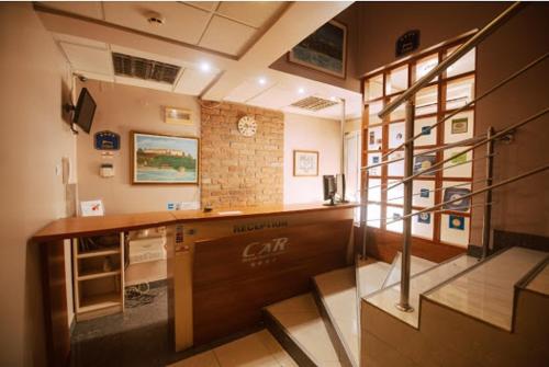 a office with a desk in a room at Car Royal Apartments and Rooms in Novi Sad