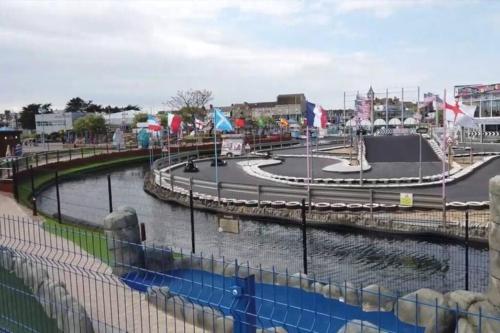 a view of a river with a tennis court at Mablethorpe Static Holiday Home in Mablethorpe