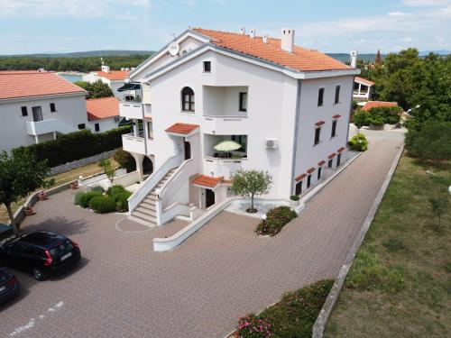 Fotografia z galérie ubytovania Apartmani Manzoni v destinácii Punat