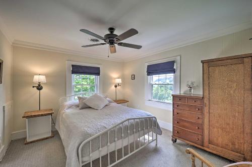 a bedroom with a bed and a ceiling fan at Abingdon Family Getaway with Porch and Views! in Abingdon
