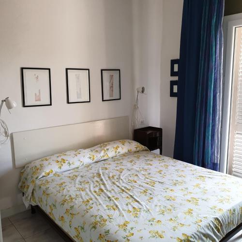A bed or beds in a room at Accogliente casa indipendente a 10 min dal mare