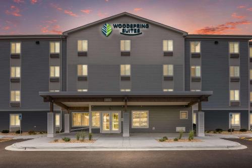 a rendering of the front of a building at WoodSpring Suites Chicago Midway in Burbank