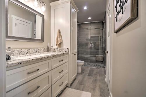a bathroom with two sinks and a shower at Hootenanny at Horton Creek Creekside Escape! in Helen