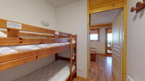 Postel nebo postele na pokoji v ubytování La Grive FAMILLE & MONTAGNE appartements 6pers montagne by Alpvision Residence