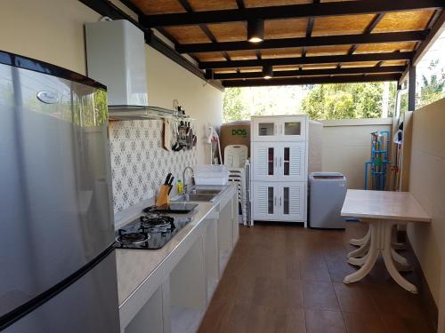 a kitchen with a sink and a counter top at Sila Thai Pool Villa1 in Ao Nang Beach
