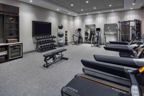 a fitness room with treadmills and a gym at Holiday Inn Express - Boston Logan Airport - Revere by IHG in Revere