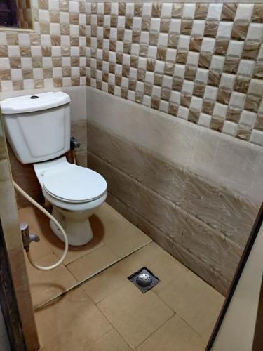 Koupelna v ubytování Hotel Sarada Nivas