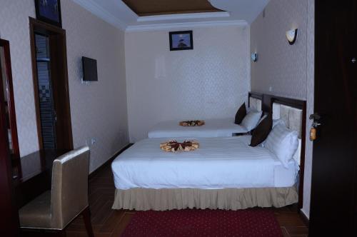 Guzara Hotel Addisにあるベッド
