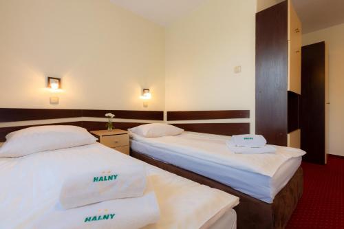 Letto o letti in una camera di Halny Pensjonat