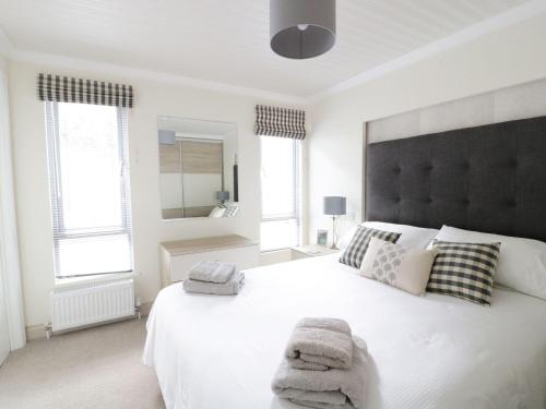 Ένα ή περισσότερα κρεβάτια σε δωμάτιο στο 44 Heritage Park