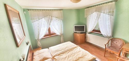 Postel nebo postele na pokoji v ubytování Villa Filip