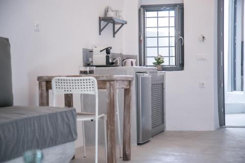 Kuchyň nebo kuchyňský kout v ubytování Theodora Suites