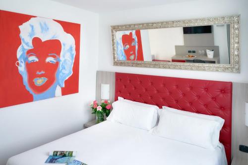 Cama o camas de una habitación en Hotel Omnia