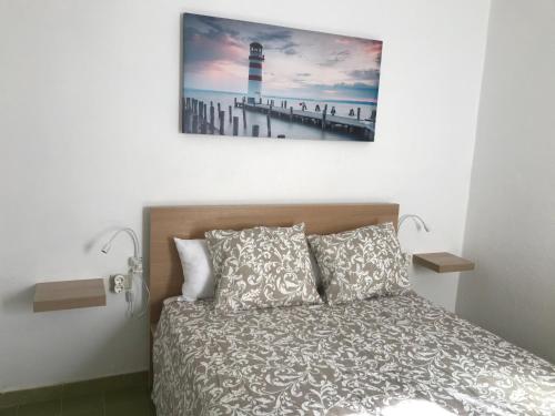 Postel nebo postele na pokoji v ubytování Vivienda Vacacional Delia Castillo 5A