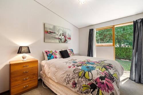 Voodi või voodid majutusasutuse Merioneth Retreat - Arrowtown Holiday Home toas