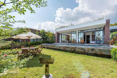 Zahrada ubytování BOM HOMES - Flamigo Dai Lai Resort CBT