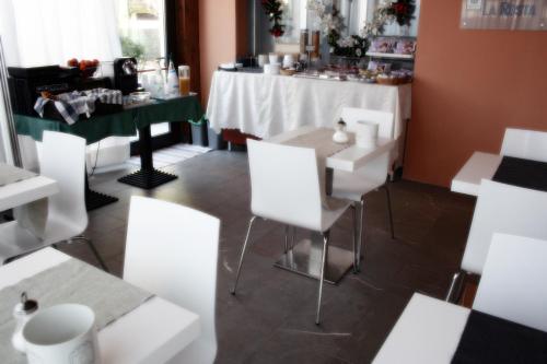 En restaurant eller et andet spisested på Hotel La Rosta