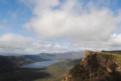 a view of a lake on the side of a mountain at Huntinaddi Lodge in Halls Gap