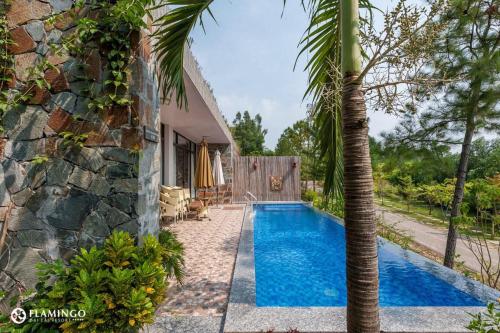 Bazén v ubytování BOM HOMES - Flamigo Dai Lai Resort CBT nebo v jeho okolí