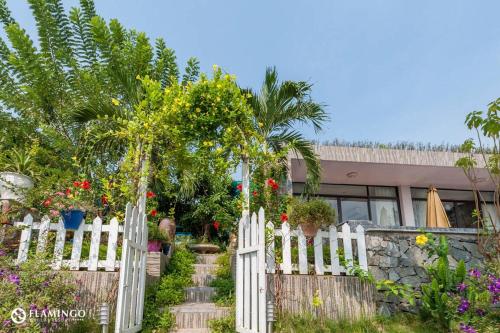Zahrada ubytování BOM HOMES - Flamigo Dai Lai Resort CBT