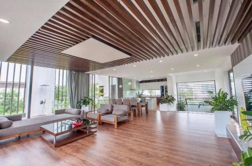 Posezení v ubytování BOM HOMES - Flamigo Dai Lai Resort CBT