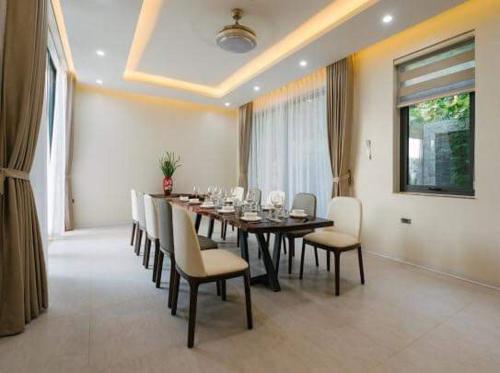 Posezení v ubytování BOM HOMES - Flamigo Dai Lai Resort CBT