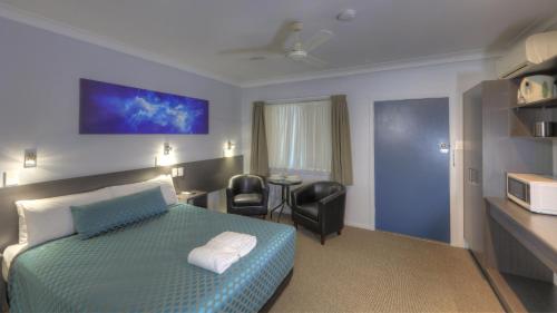 Katil atau katil-katil dalam bilik di Grafton Central Motel